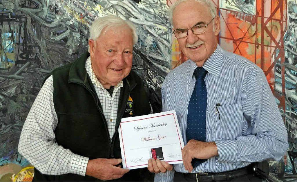 Mayor Ron Bellingham (right) presents Bill Greer with a lifetime membership to the Warwick Art Gallery for his 12 years of volunteer service. Mayor Ron Bellingham (right) presents Bill Greer with a lifetime membership to the Warwick Art Gallery for his 12 years of volunteer service.